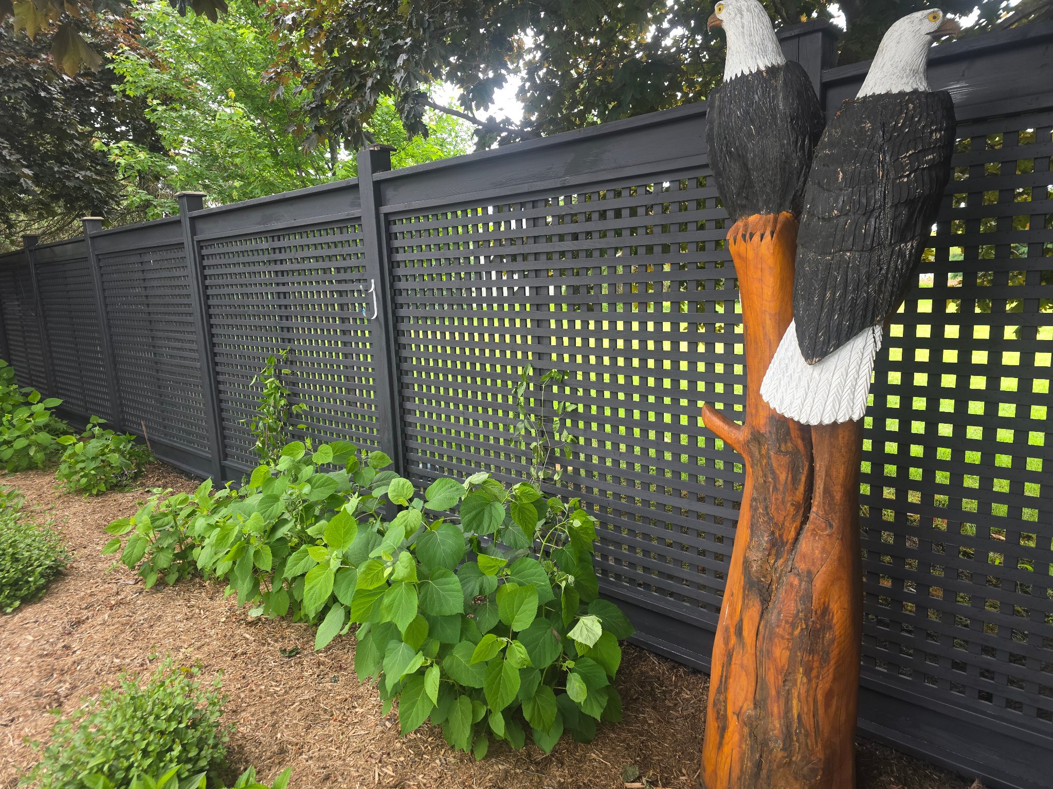 Two-tone fence staining Vaughan - modern gray and tan residential fence